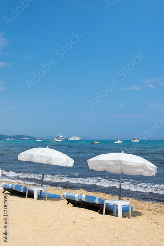 Beach with parasols and beds