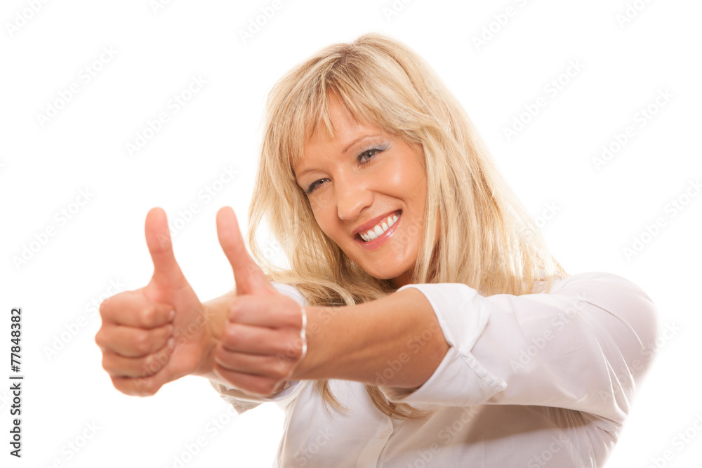 Mature woman giving thumbs up sign isolated Mature woman giving thumbs up sign isolated