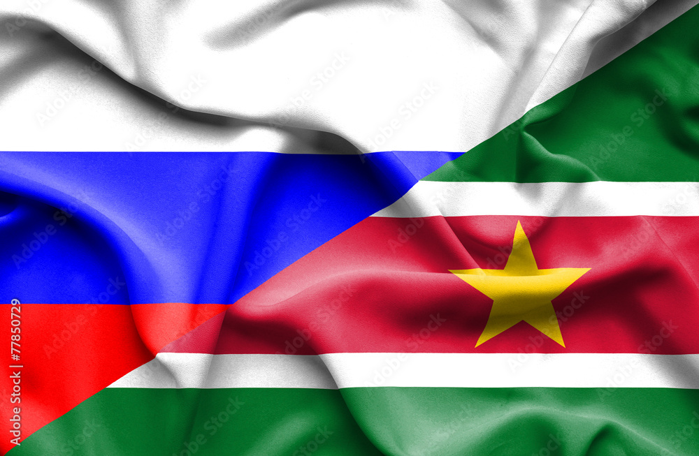 Waving flag of Suriname and Russia