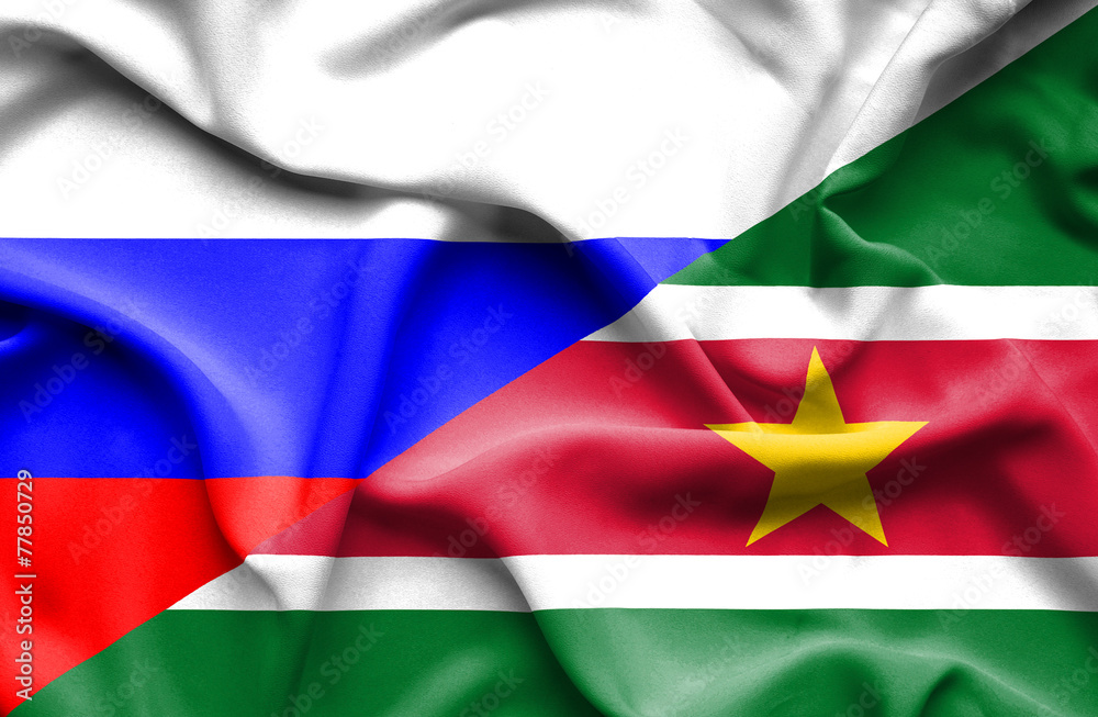 Obraz premium Waving flag of Suriname and Russia