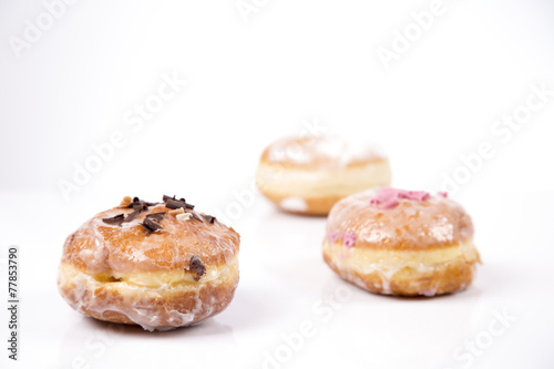 Jummy fresh isolated donuts on white background