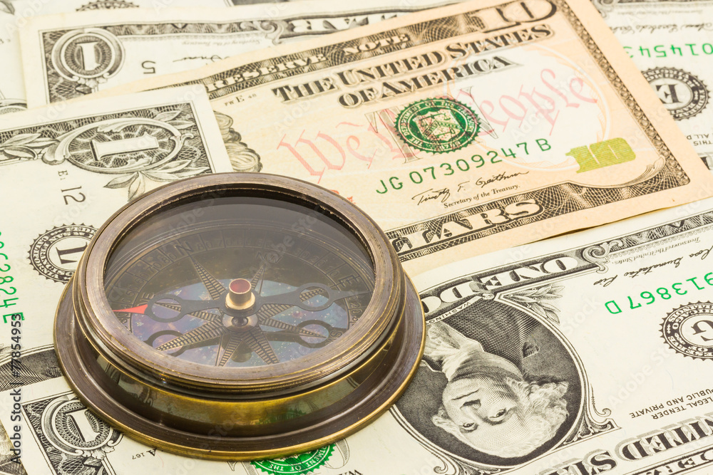 Compass on dollar banknote . Compass on dollar banknote .