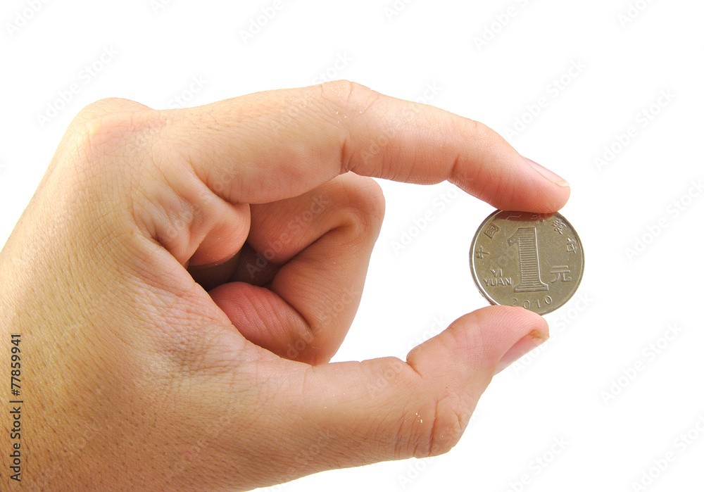 Hand holding a yuan coin isolated on white background. Hand holding a yuan coin isolated on white background.