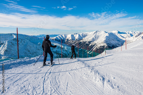 Father and son skiing.