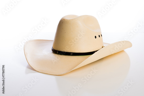 Straw Cowboy hat on white background