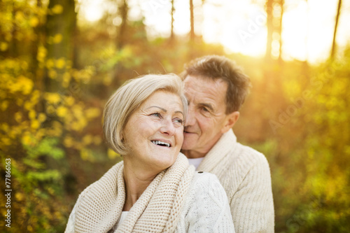 Active seniors taking walk in nature