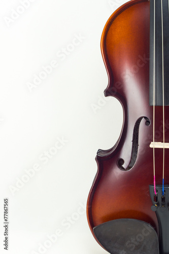 Wooden violin on white background
