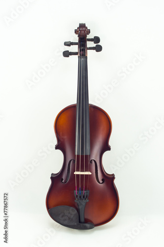 Wooden violin on white background