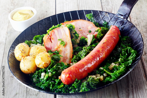 Gourmet German Cuisine on Pan with Mustard on Side