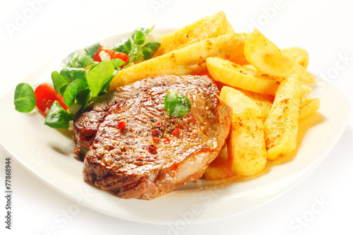 Flavored Grilled Meat with French Fries on Plate