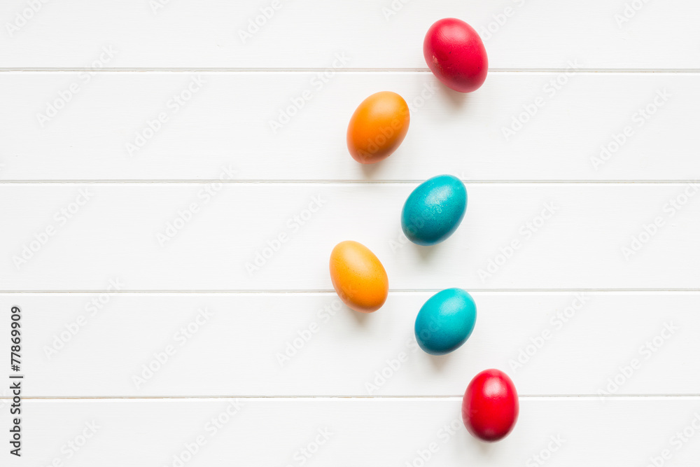 Easter eggs arrangement with copy space on wodden background