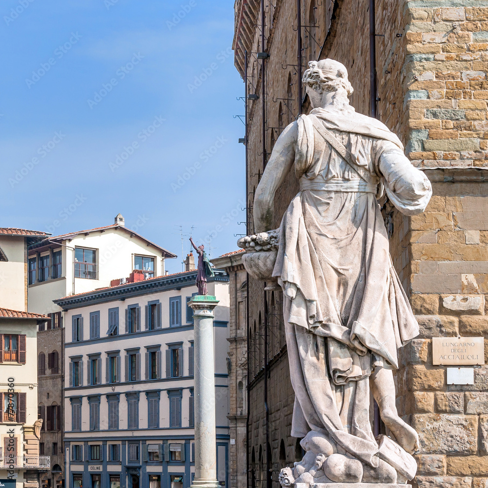 historic centre and statues in Florence, Italy