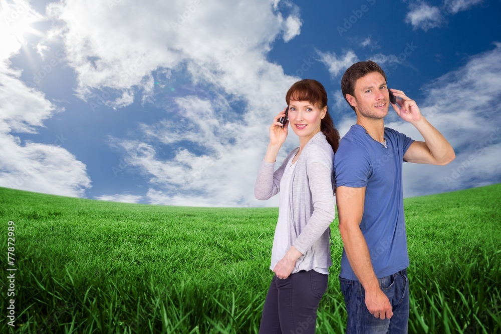 Composite image of couple both making phone calls Composite image of couple both making phone calls