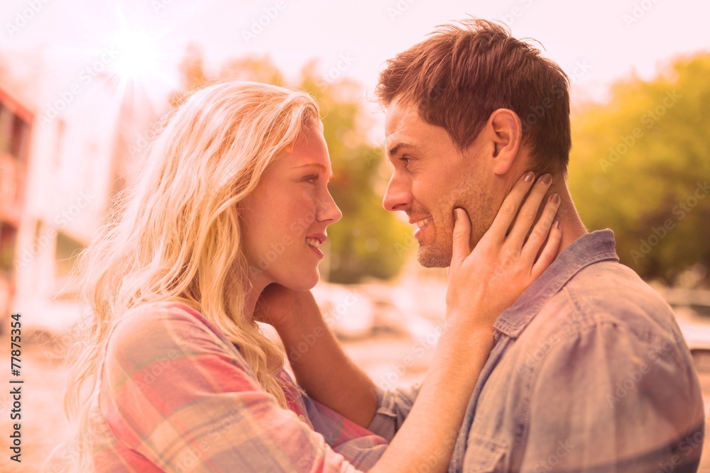 Fototapeta premium Hip young couple smiling at each other