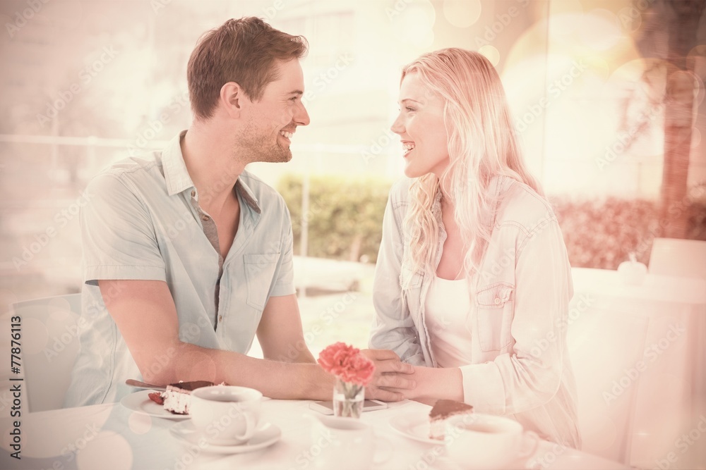 Hip young couple having desert and coffee together Hip young couple having desert and coffee together