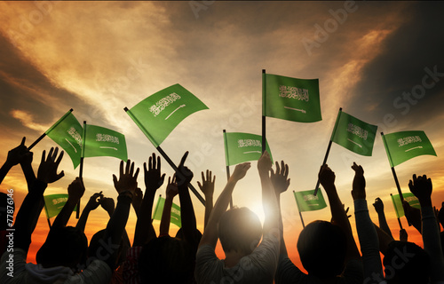 Canvas Print Silhouettes People Holding Flag Saudi Arabia Concept
