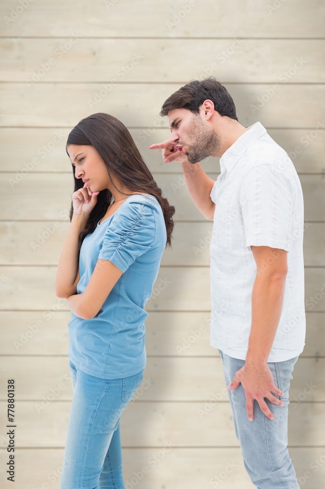 Composite image of angry man shouting at girlfriend Composite image of angry man shouting at girlfriend