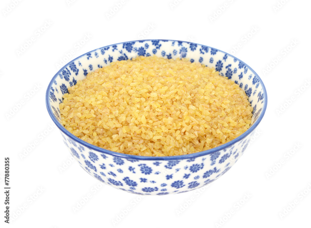 Bulgur wheat in a blue and white china bowl