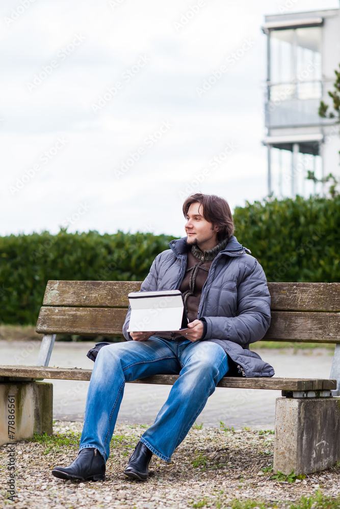 Man with tablet outdoor Man with tablet outdoor