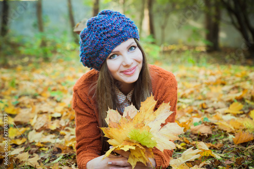 Beautiful girl in autumn leaves 