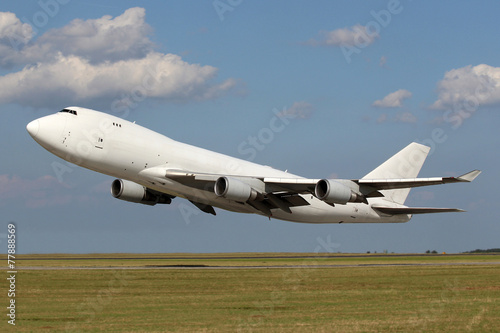 Low pass of big white plane