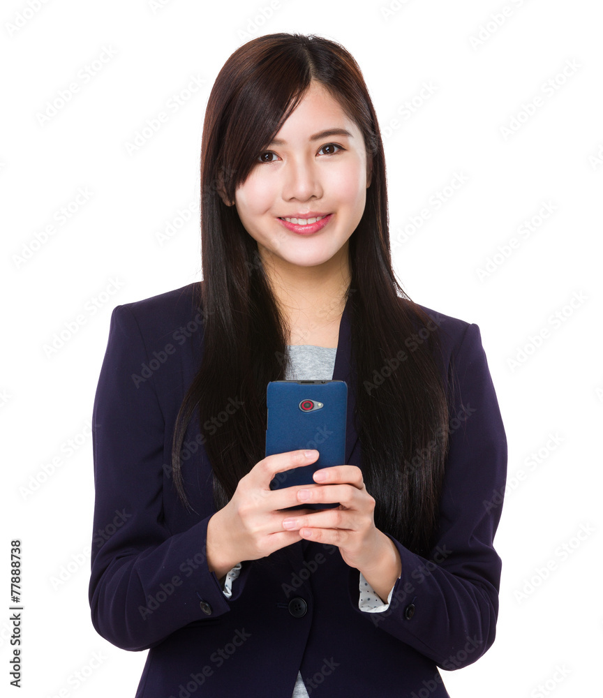 Businesswoman use of cellphone Businesswoman use of cellphone