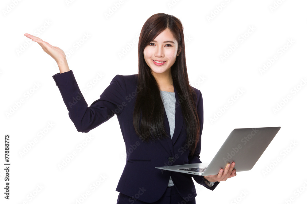 Businesswoman use of laptop and open hand palm Businesswoman use of laptop and open hand palm