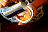 cup of coffee latte art on the wood background in vintage color