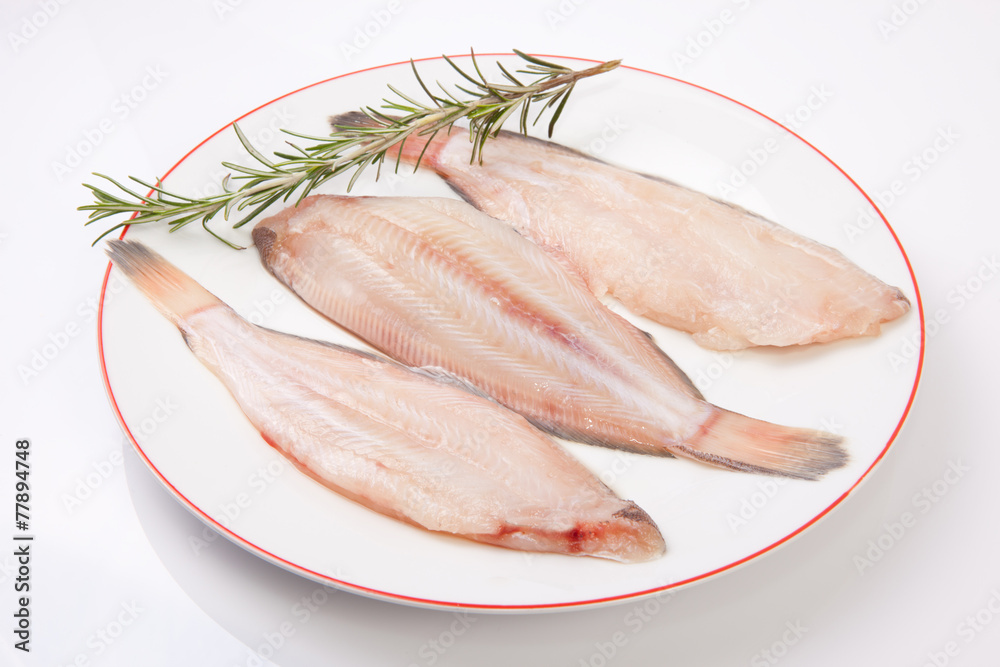 Raw sole fish with rosemary