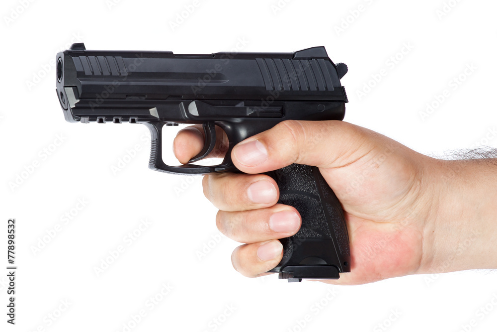 Gun in the hand isolated on white background Gun in the hand isolated on white background