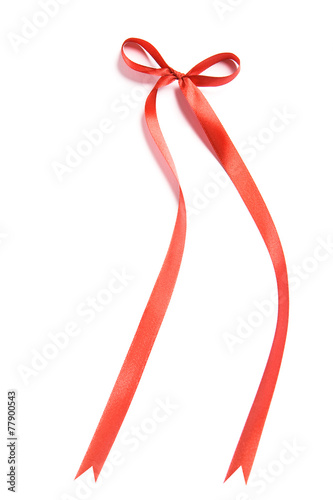 Shiny red satin ribbon and bow on white background