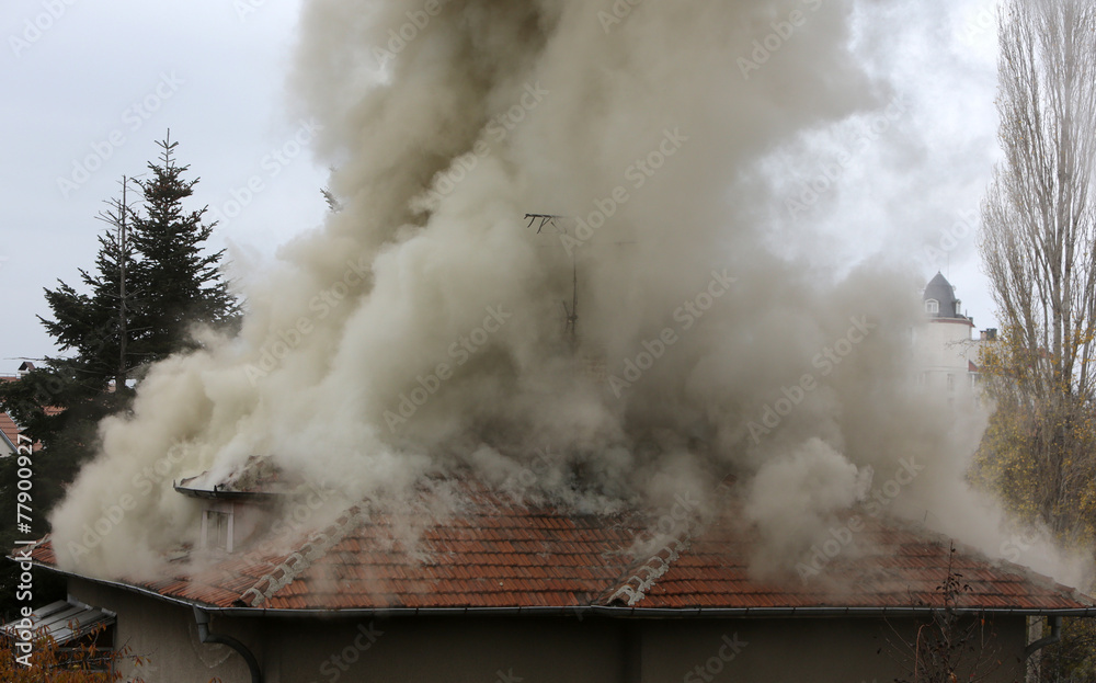 Burning house roof