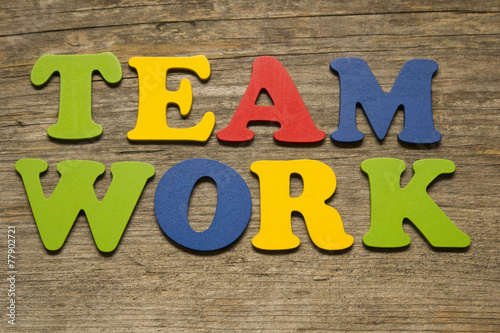 word Teamwork on a wooden background