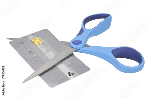 Fotografie Cutting up Credit Card With Scissors