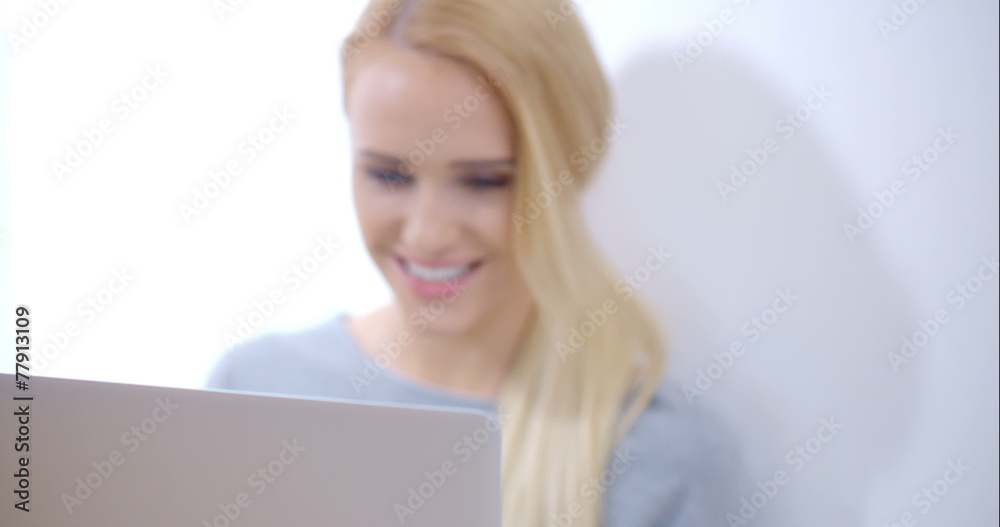 Blurred Woman Using her Laptop Computer Blurred Woman Using her Laptop Computer
