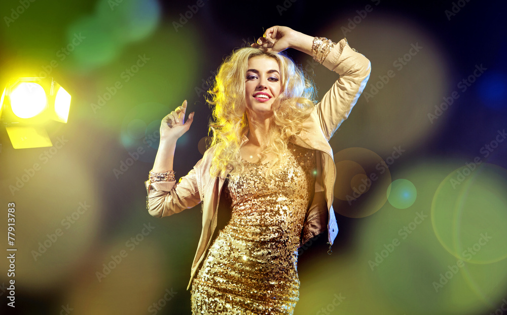 Naklejka premium Young elegant woman on the party