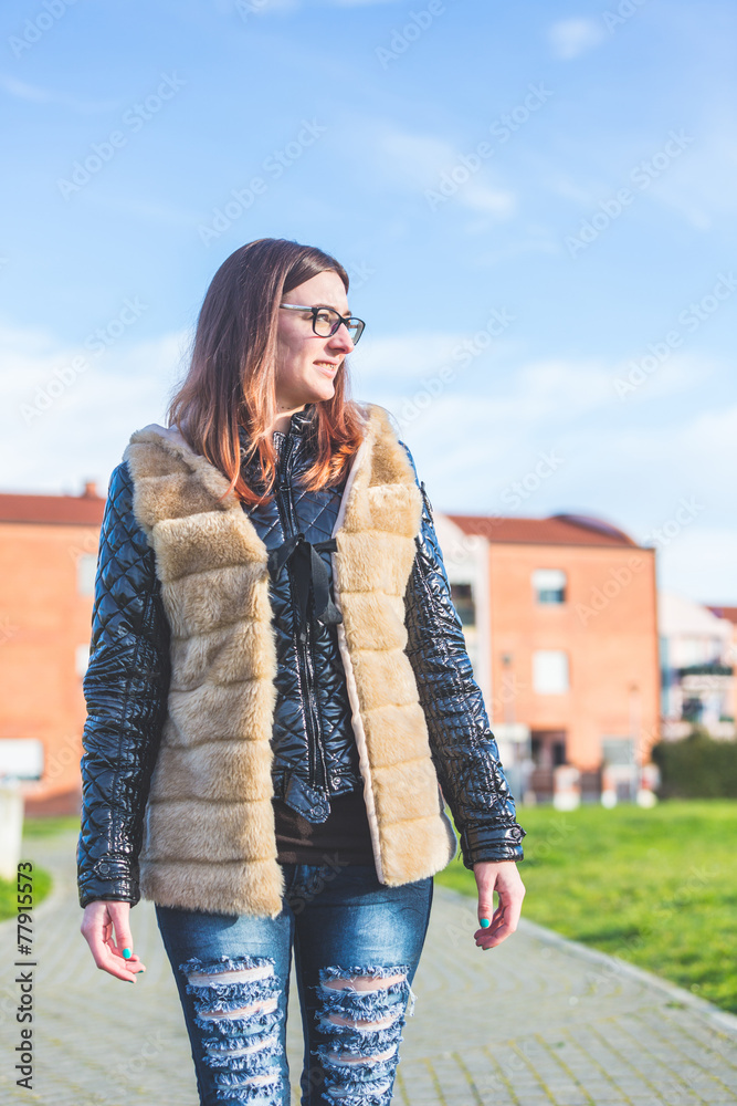 Young Woman Walking at Park in the Morning. Young Woman Walking at Park in the Morning.