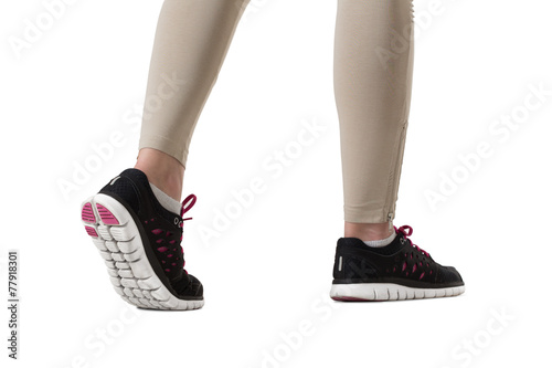 Runner feet. Woman fitness sneakers