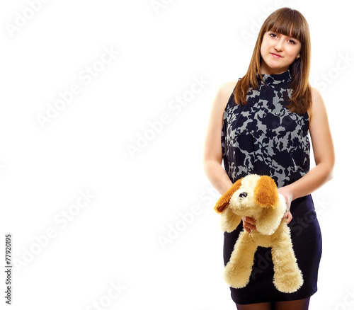 A girl with a toy puppy, isolated