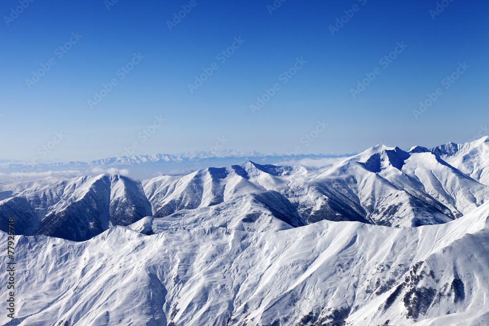 Winter mountains at sun day