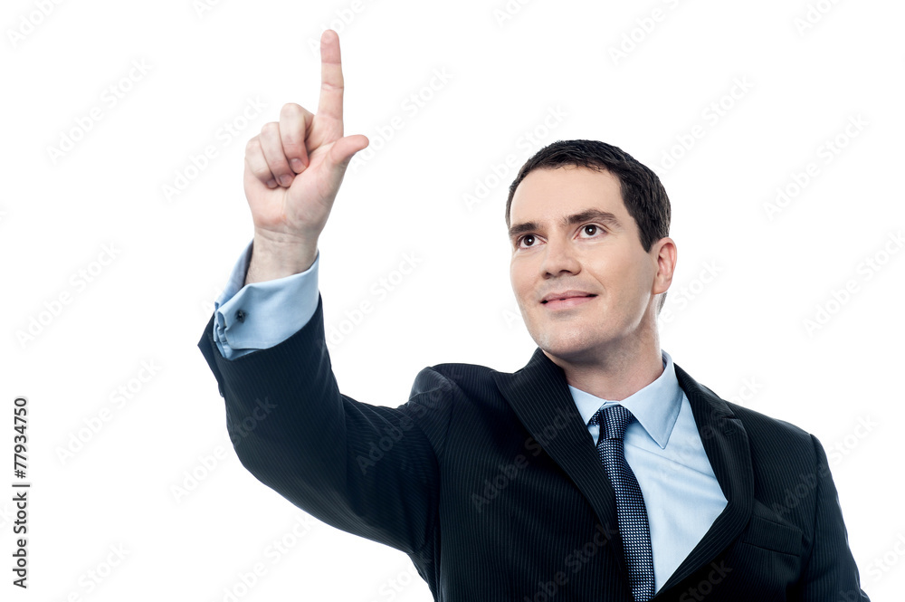 Businessman pushing tactile button Businessman pushing tactile button