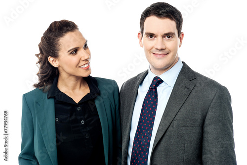 Business couple posing over white