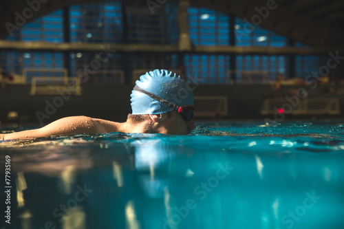 Male swimmer at the swimming pool.