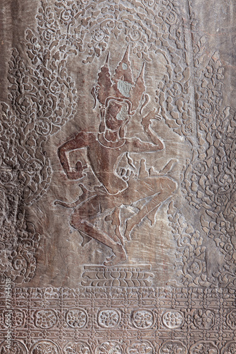 Carving of dancing Shiva on the wall of Angkor Wat