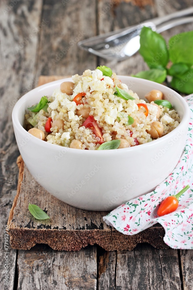 Quinoa salad with vegetables,chickpea and feta.Selective focus. Quinoa salad with vegetables,chickpea and feta.Selective focus.