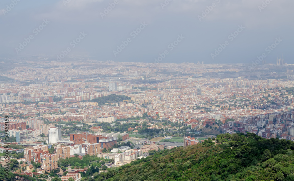 Panorama on Barcelona city at hot summer day from Montjuic castl