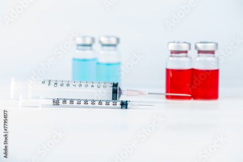 Injection syringe and vials background