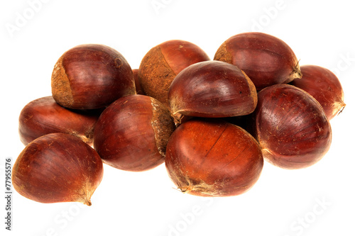 Fresh chestnuts isolated on white