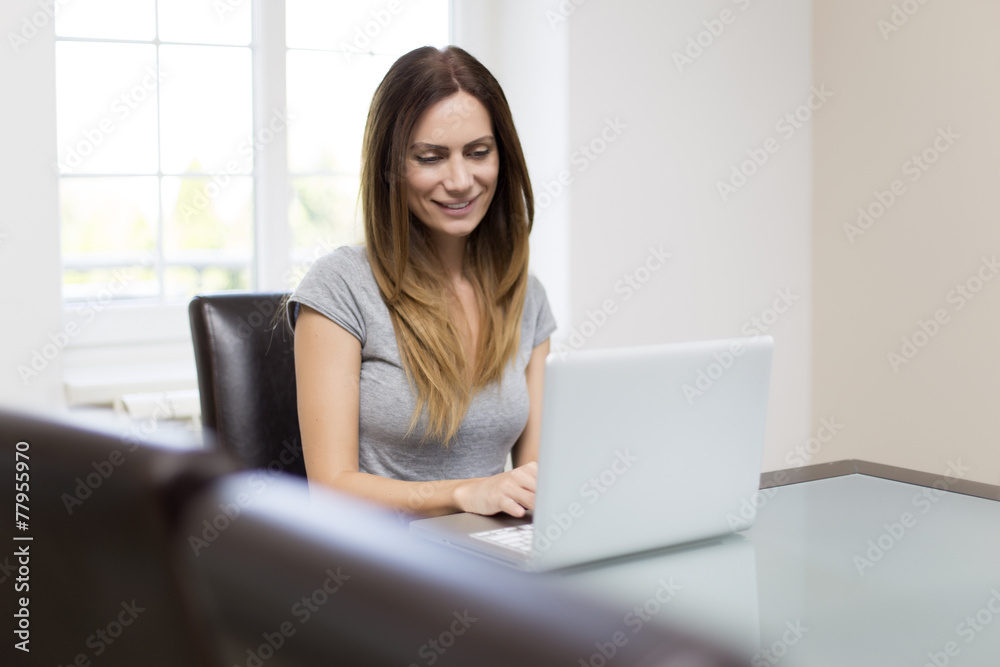 Young woman working on laptop Young woman working on laptop