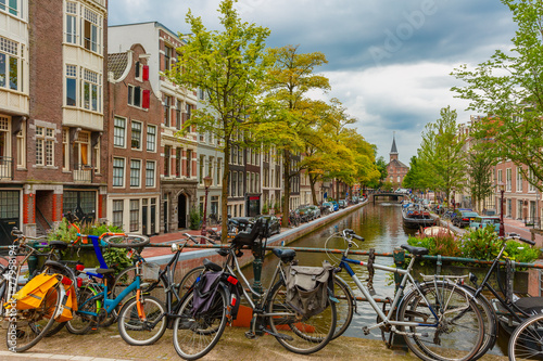 Amsterdam canal and bridge with bikes, Holland, Netherlands